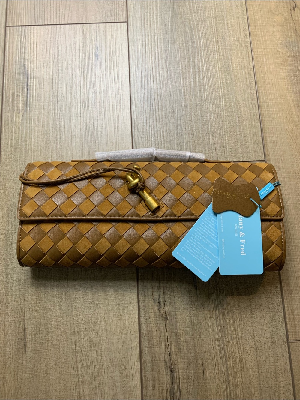 *New* Tiffany & Fred Woven Cognac Leather Clutch with Tassel Charm